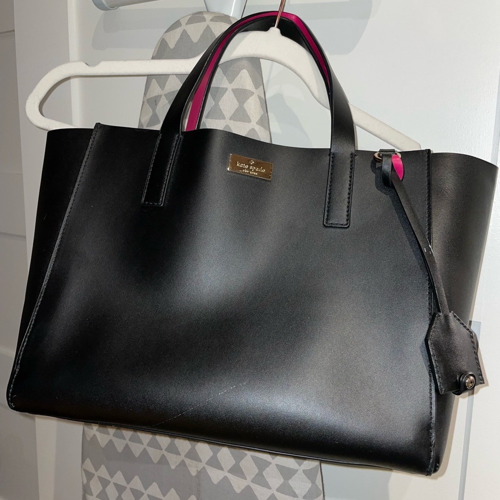 Kate Spade black tote bag with hot pink interior